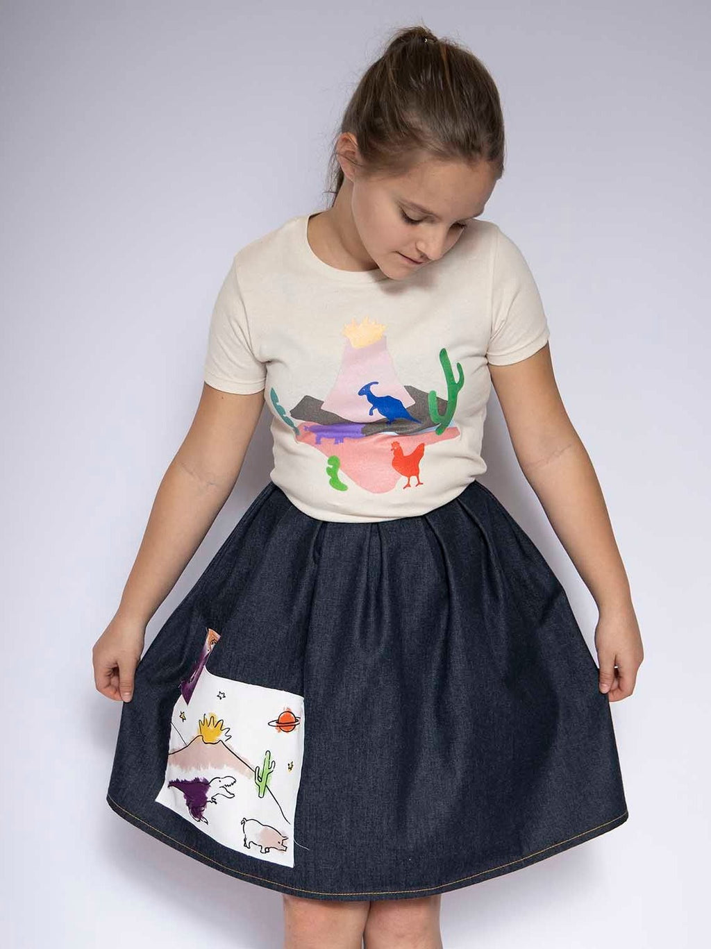Blue denim skirt with appliqué